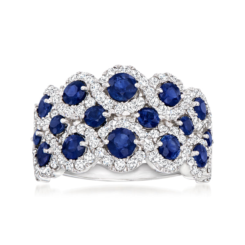 14kt white gold ring with round blue sapphire center stones and diamond halo