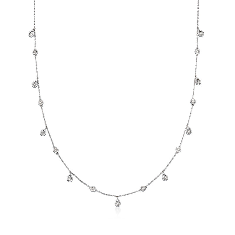 Sterling silver diamond station drop necklace with small round bezel-set drops