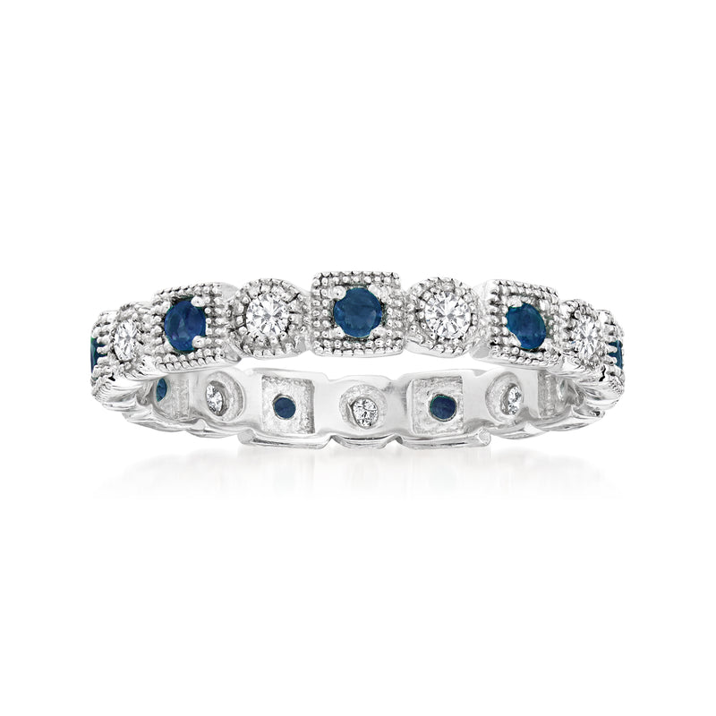 Sterling silver eternity band with round diamonds and blue sapphire accents