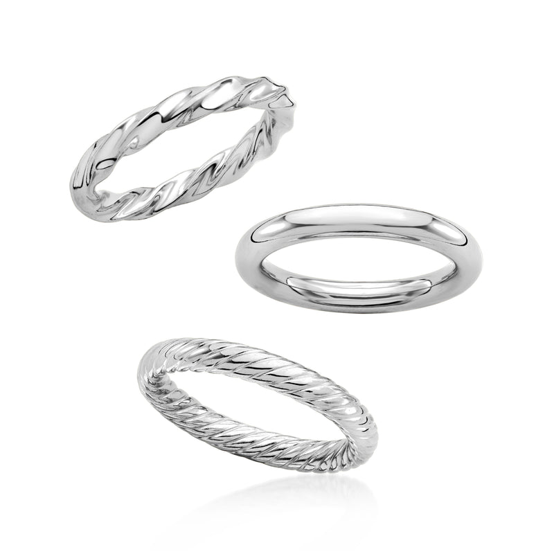 Sterling silver three-ring set: wavy band, smooth oval band, and braided ring