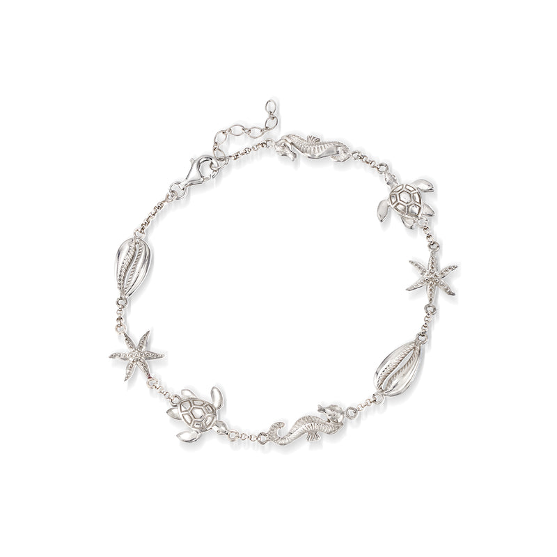 Sterling silver sea life anklet with starfish, shell, and turtle charms