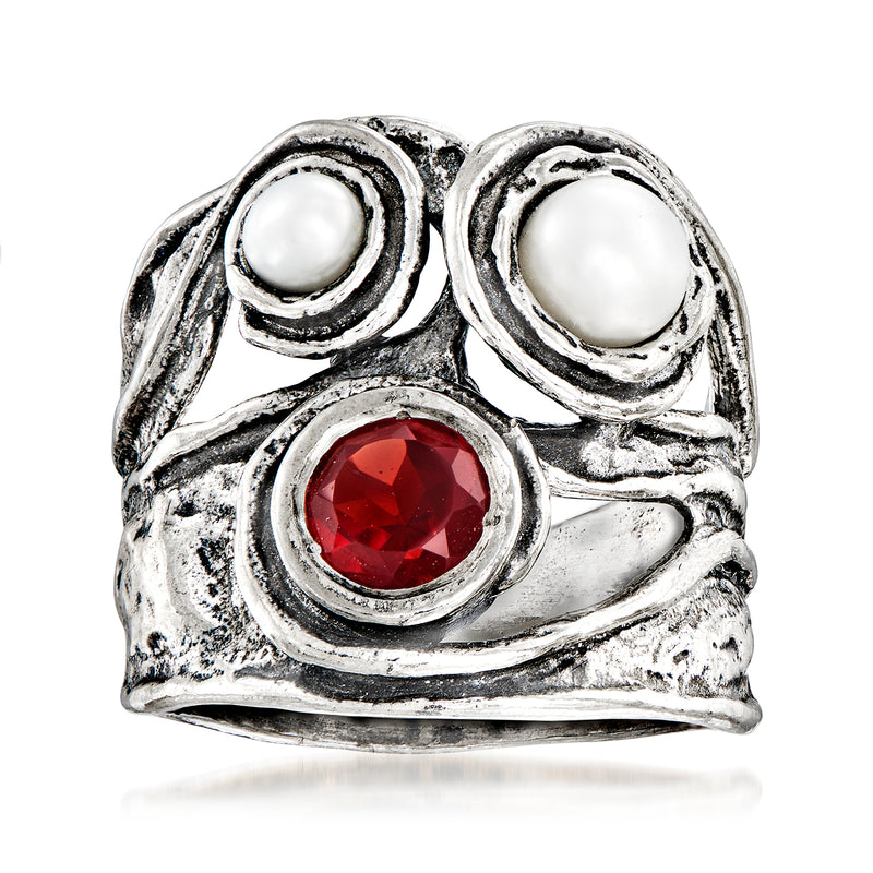 Sterling silver ring with white cultured pearl and red garnet swirl, ornate setting