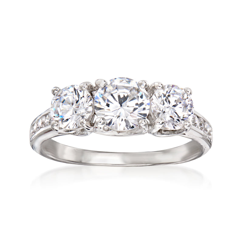 Three-stone CZ ring in sterling silver, three round stones in shared prong setting