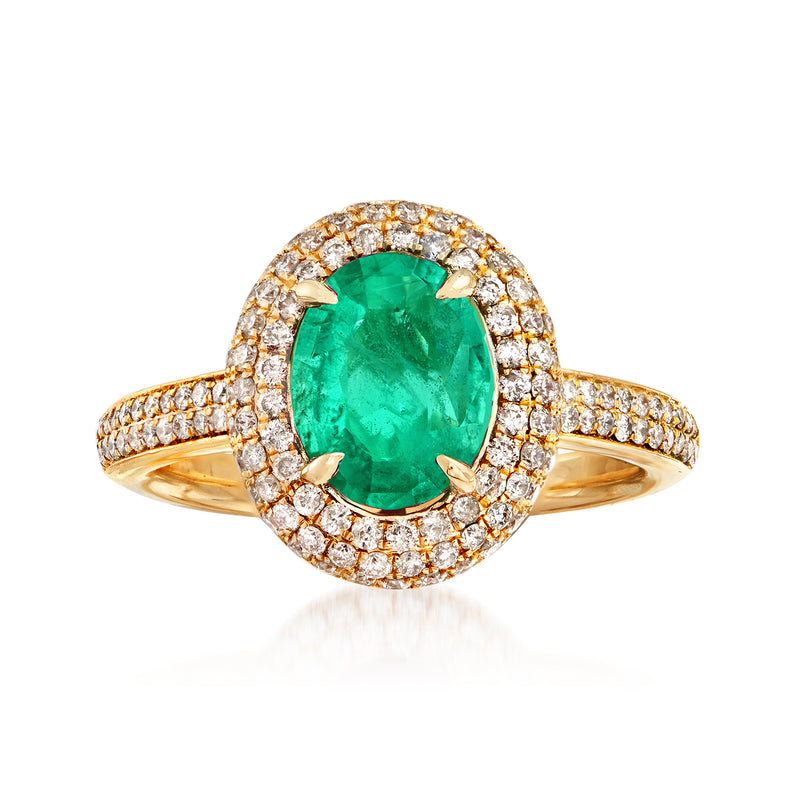 Emerald and diamond halo ring in yellow gold with oval green center stone