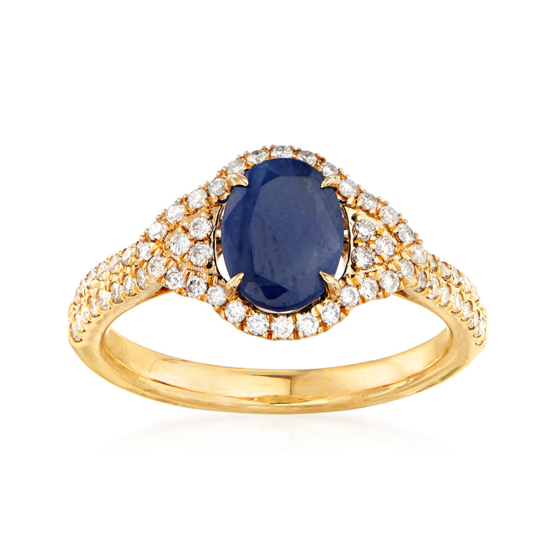 14kt yellow gold ring with oval blue sapphire and diamond halo