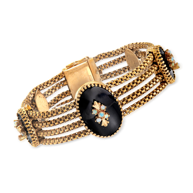 Vintage 14kt yellow gold section bracelet with black onyx cabochon and opal accents