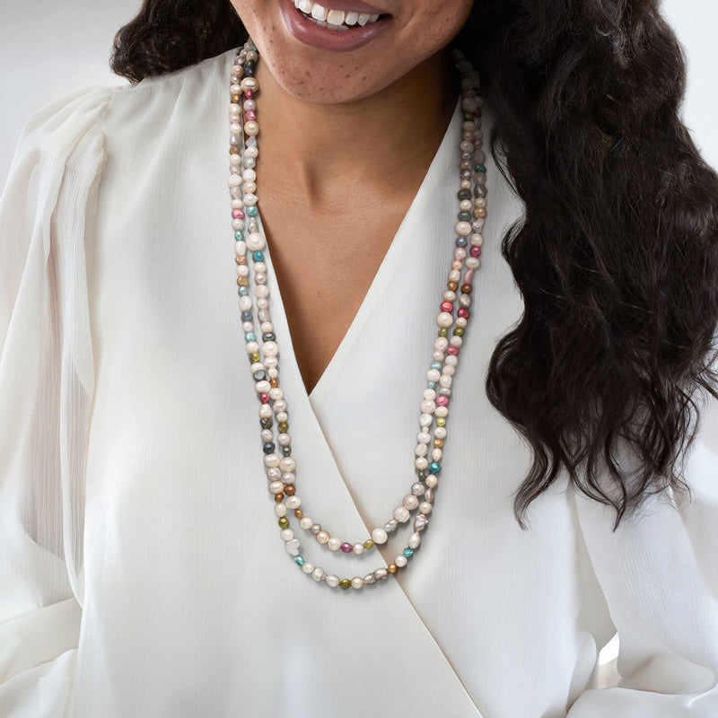 Multicolored baroque cultured pearl necklace, multi-strand drape worn on model