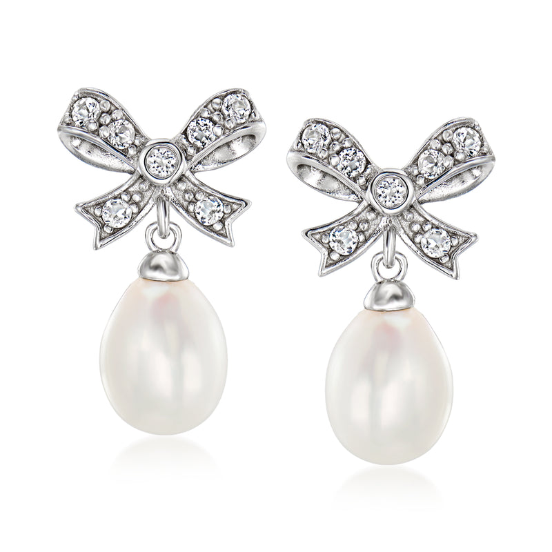 Sterling silver bow drop earrings with white pearl teardrop and clear gemstone accents