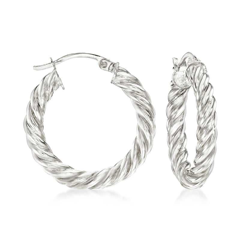 Twisted silver hoop earrings with braided texture and hinged clasp, pair shown