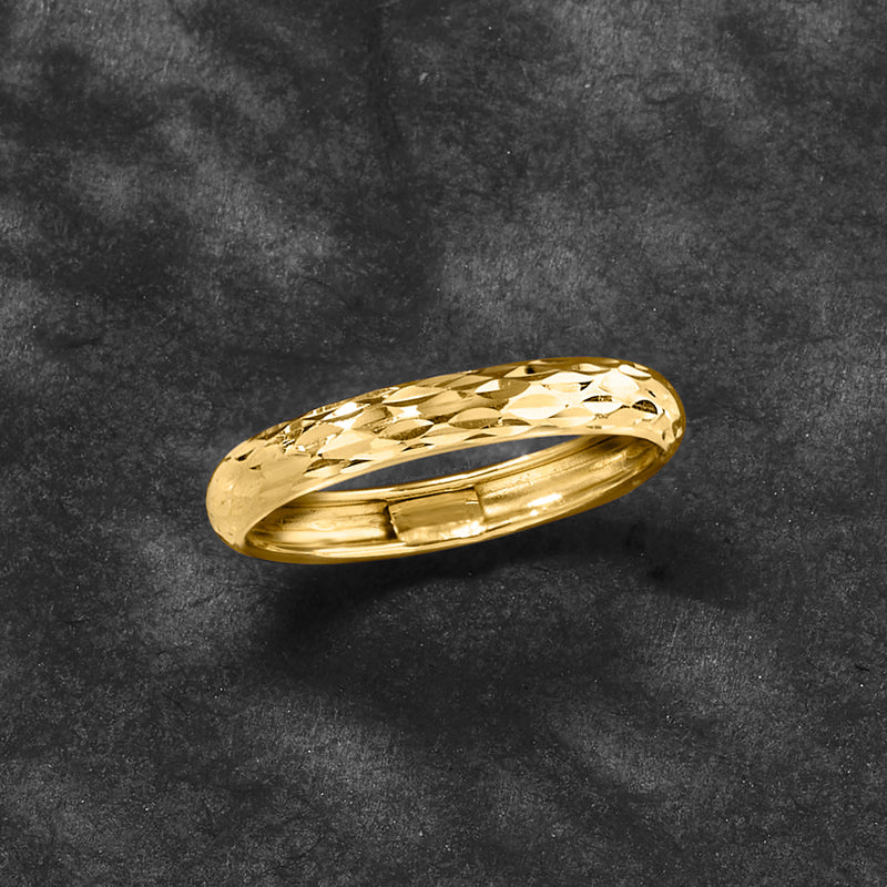 14kt yellow gold diamond-cut ring, faceted band with reflective polished finish