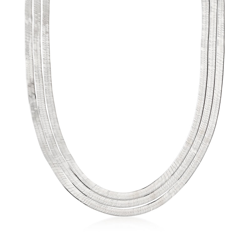 Layered sterling silver herringbone necklace, close-up of oval chain layers