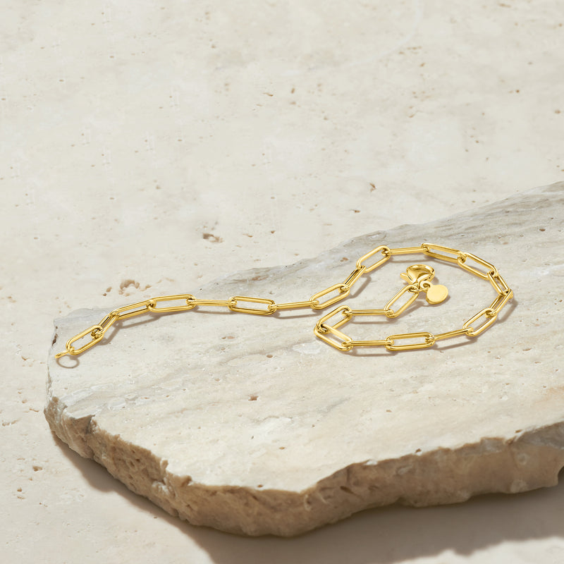 18kt yellow gold paper clip link bracelet with heart charm, open clasp view