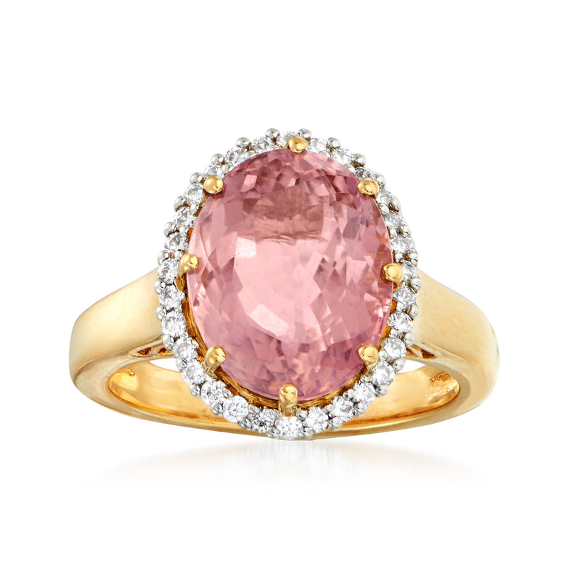 18kt yellow gold ring with oval pink tourmaline center, diamond halo
