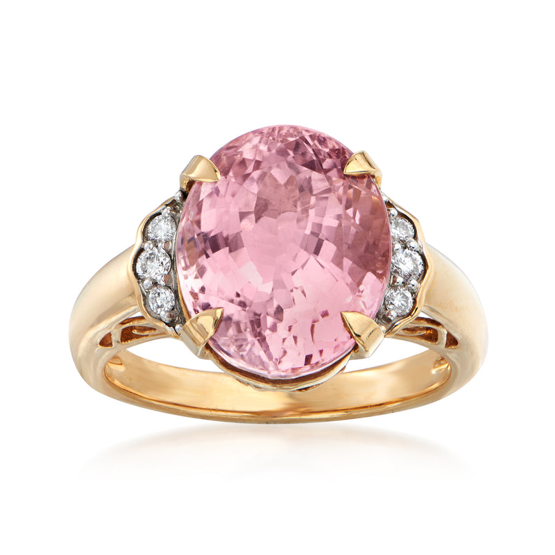 18kt yellow gold ring with large oval pink tourmaline and four round diamond accents