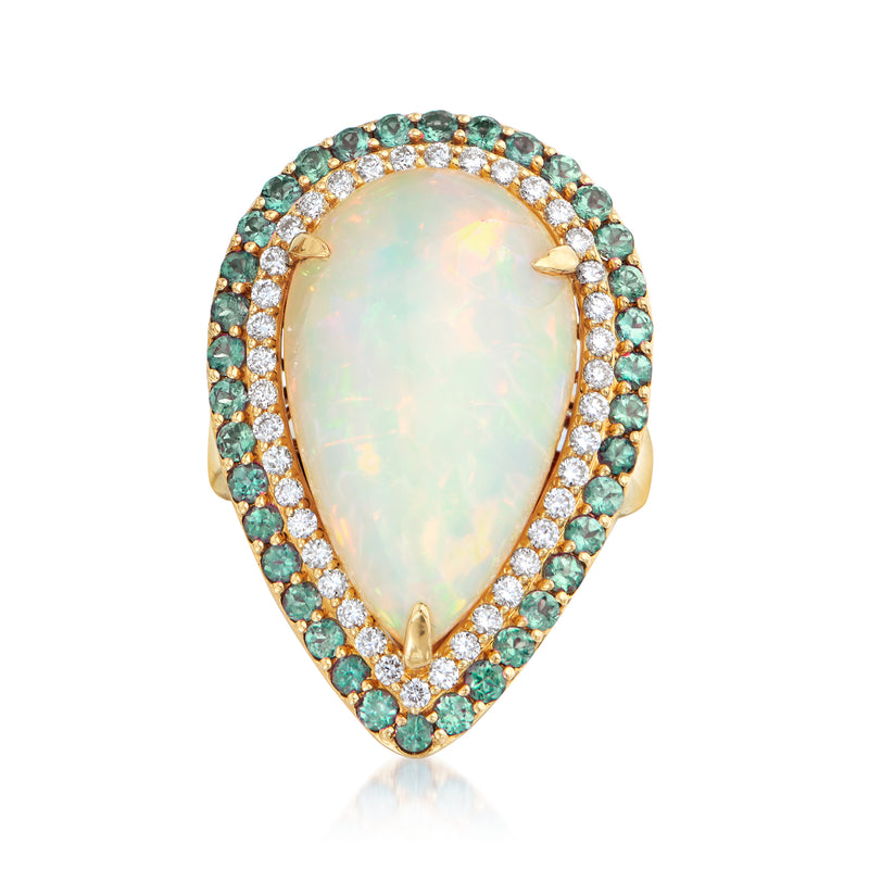 18kt yellow gold pear-shaped opal ring with diamond and green gemstone halo