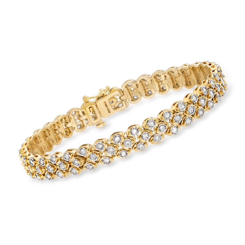 Gold-tone triple-row diamond bracelet with round bezel-set stones
