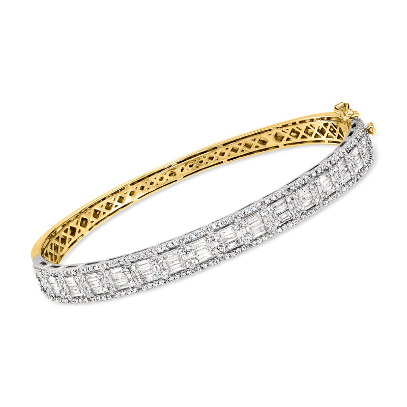 Two-tone 14kt gold diamond bangle bracelet with pave stones and openwork sides