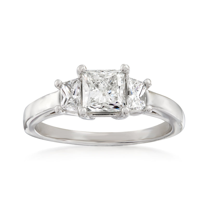 14kt white gold diamond ring with emerald-cut center and two rectangular side diamonds