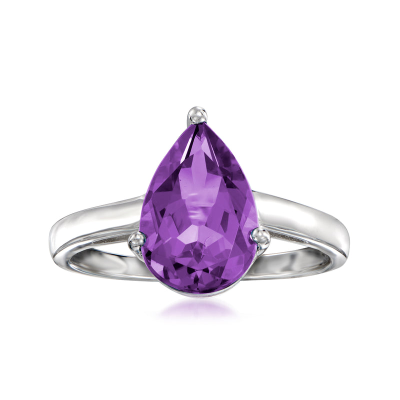 Sterling silver ring with pear-shaped purple amethyst center and three side stones
