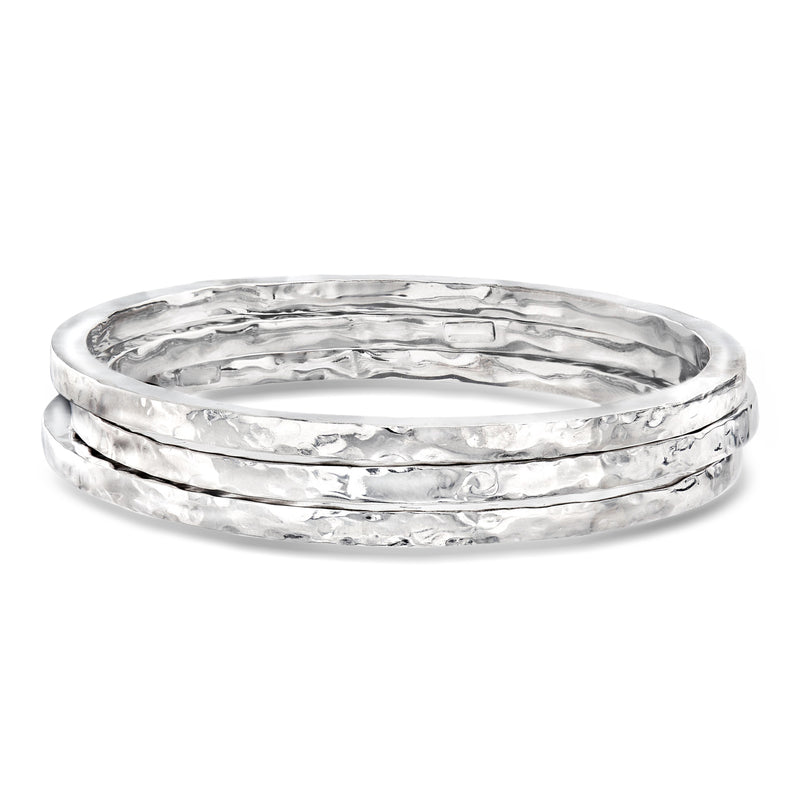 Three-piece sterling silver hammered bangle bracelets with stacked wide bands