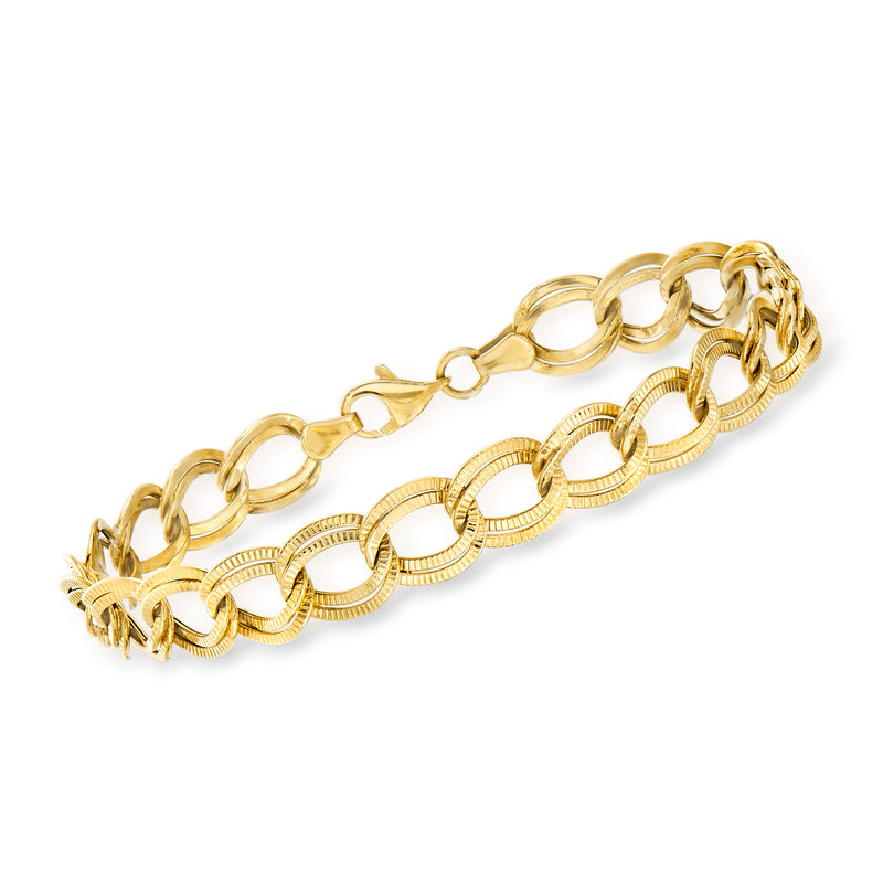 14kt yellow gold double-link bracelet with textured oval links and lobster clasp