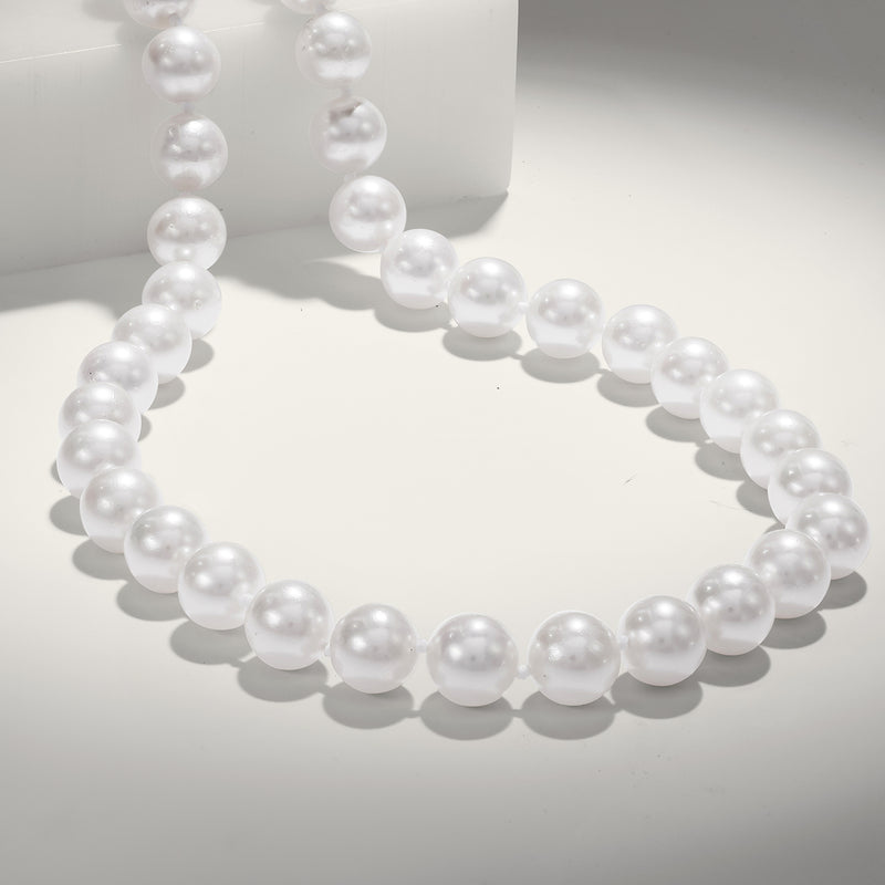 Cultured Akoya pearl necklace close-up of round white pearls