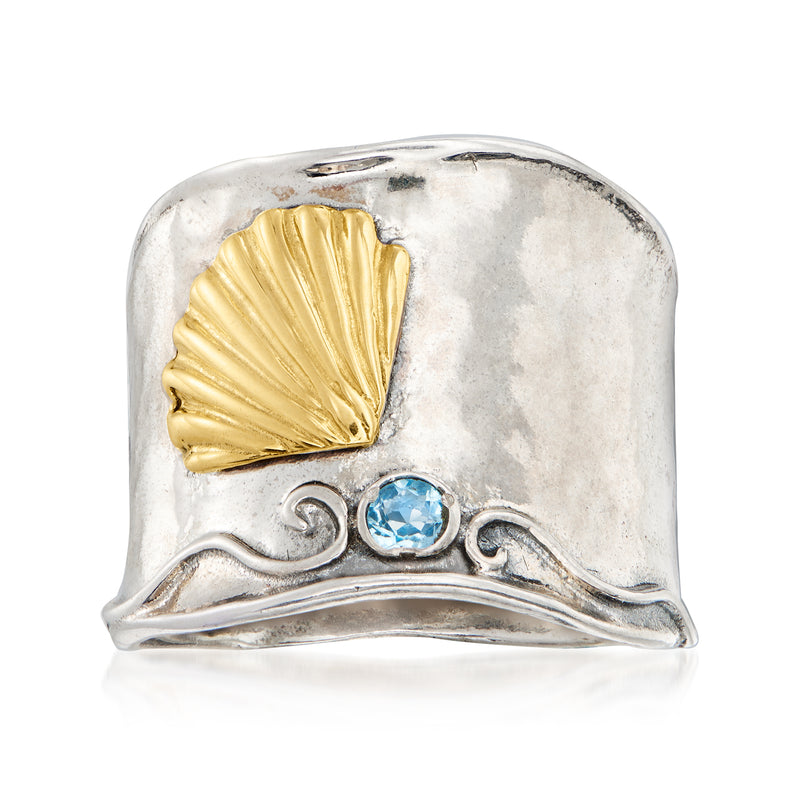 Sterling silver seashell ring with 14kt yellow gold shell and blue topaz accent