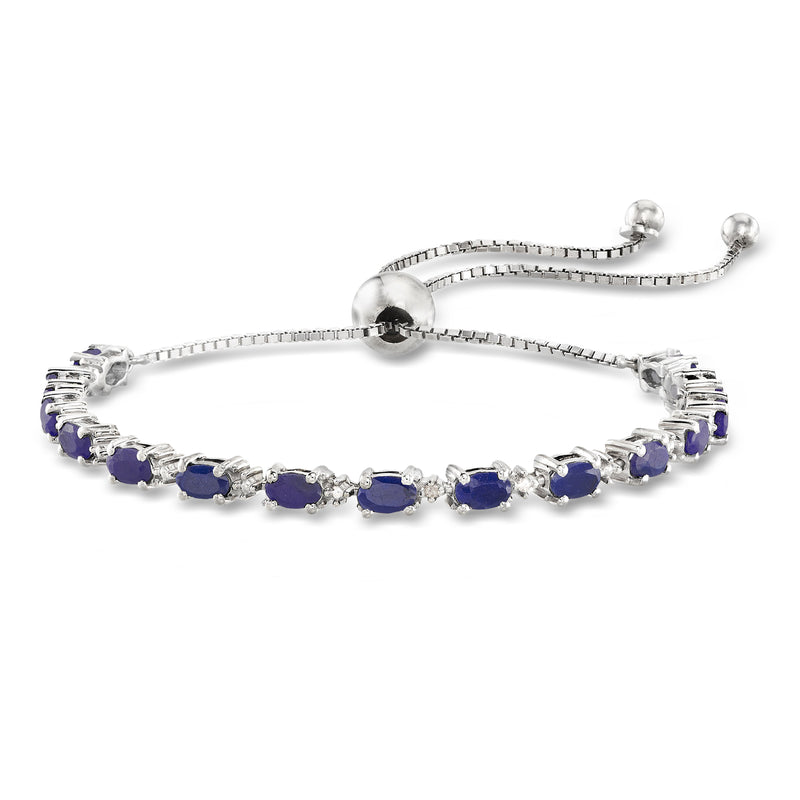 Sterling silver bolo bracelet with blue sapphire oval stones and small diamond accents