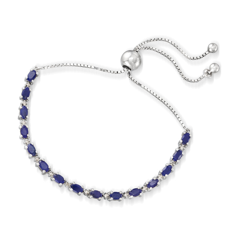 Sterling silver sapphire bolo bracelet with row of blue oval gemstones and clasp ends