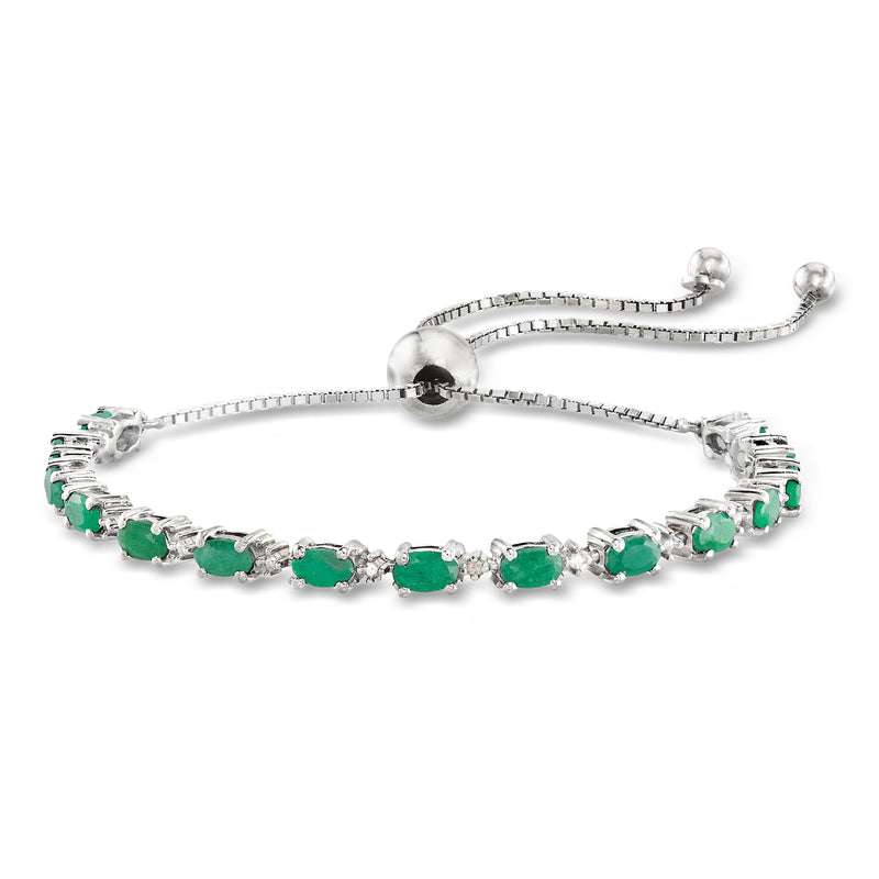 Sterling silver bolo bracelet with green emerald-style stones and diamond accents