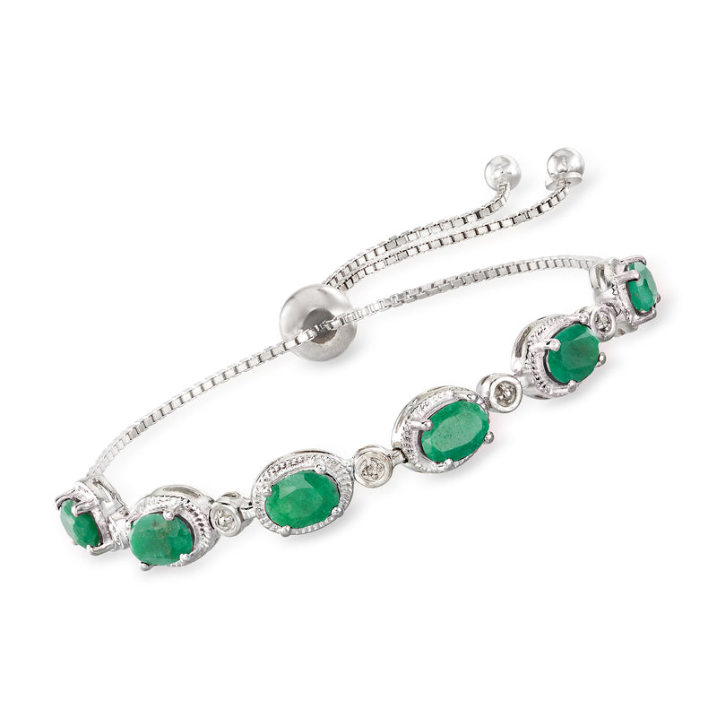 Sterling silver bolo bracelet with emerald green oval gemstones and diamond accents