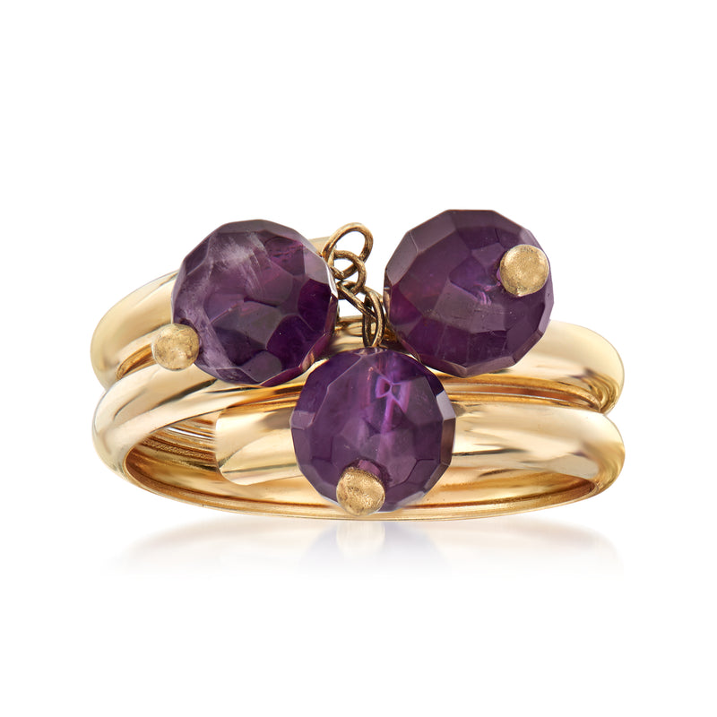 14kt yellow gold triple-coil ring with three faceted amethyst gemstones