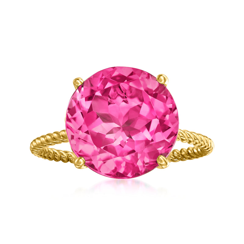 Round pink topaz ring with twisted 14kt yellow gold band and bezel setting