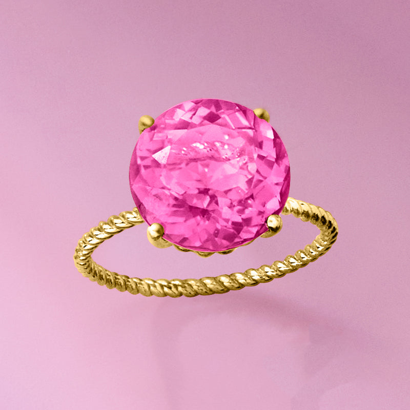 Pink gemstone solitaire ring with twisted 14kt yellow gold band, front view