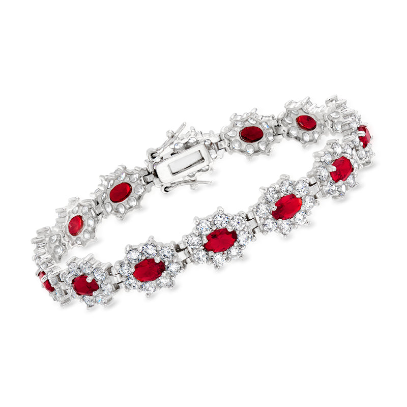 Sterling silver flower bracelet with red oval and clear CZ stones, hinged clasp