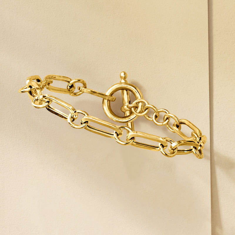 Gold-tone paperclip link bracelet, round toggle clasp detail