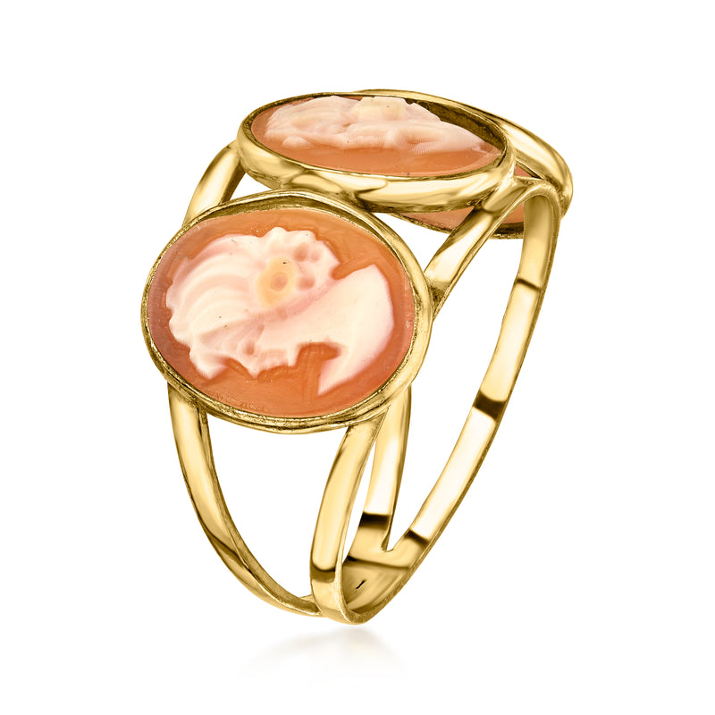 Gold-tone ring with two oval shell cameo bezels and openwork setting