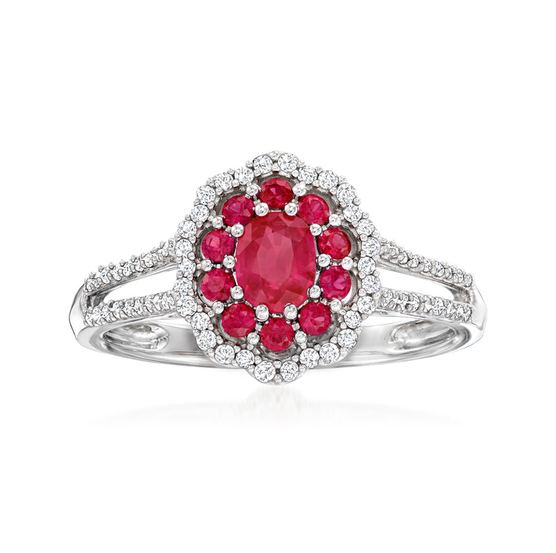 14kt white gold ruby and diamond flower ring with red center stone and halo