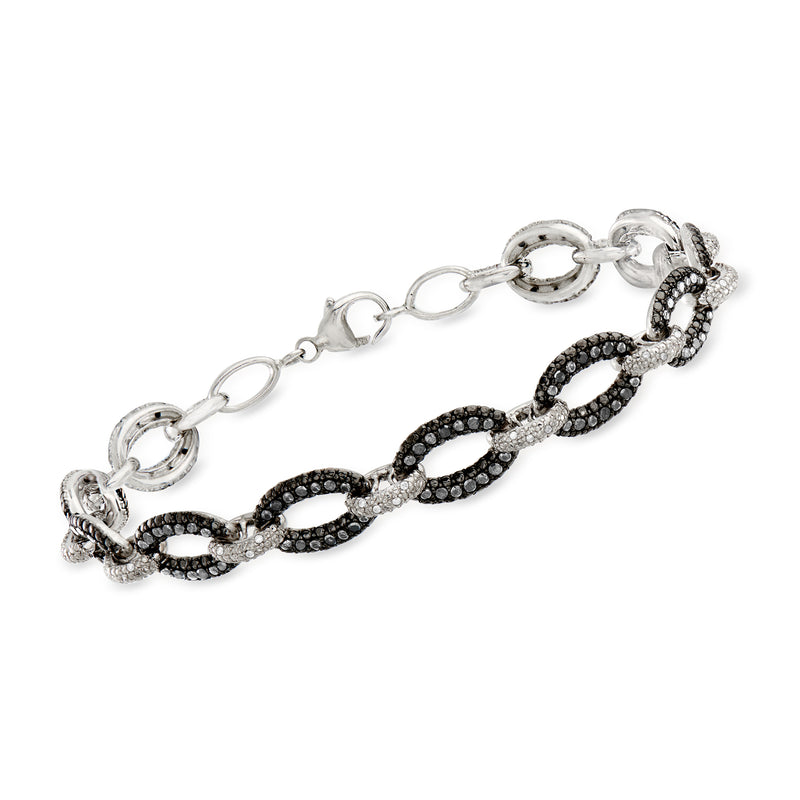 Sterling silver link bracelet with black and white diamond-set oval links