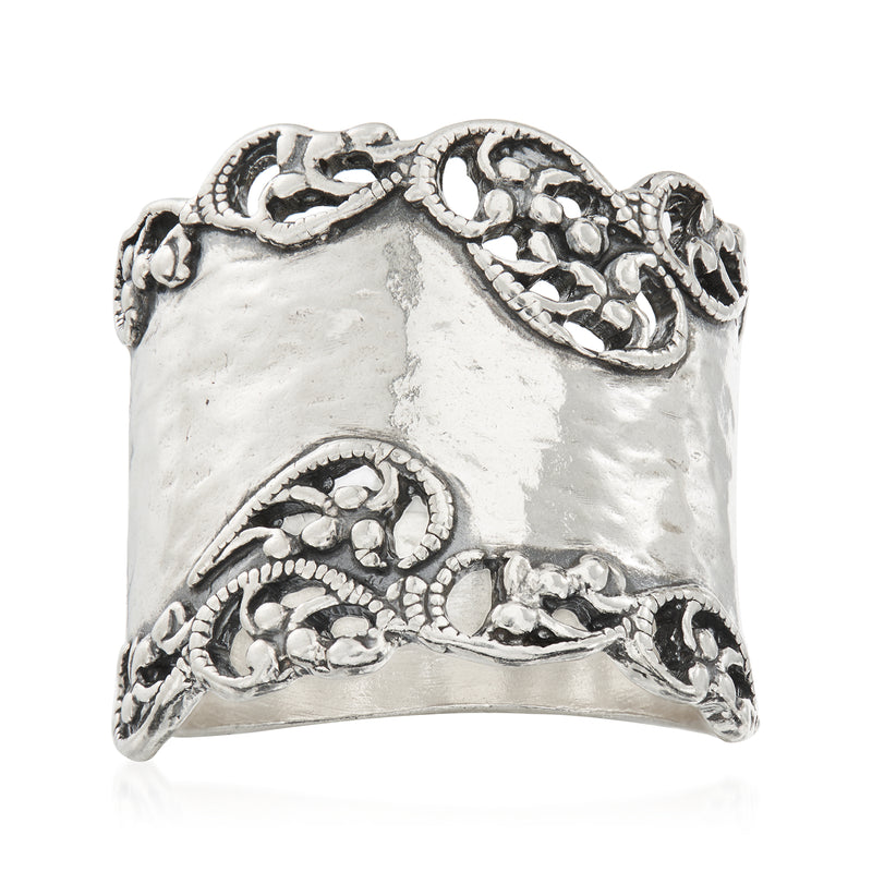 Sterling silver ring with embossed filigree edge and scrollwork details