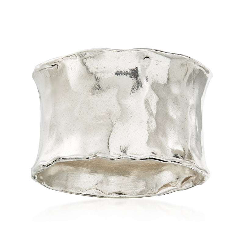 Hammered sterling silver ring, wide band with textured reflective finish.