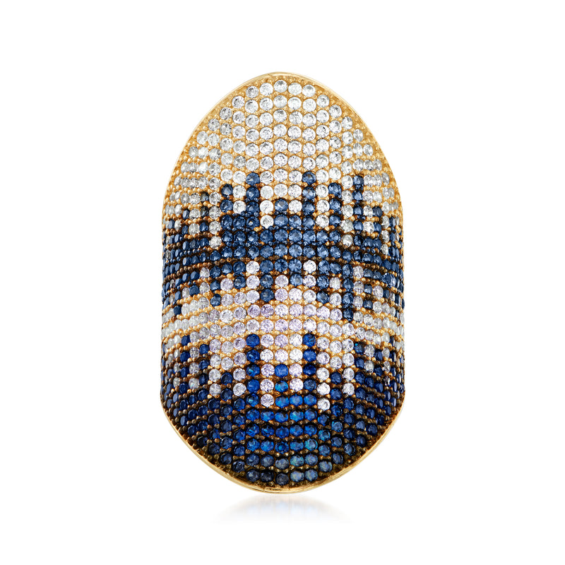 Gold-tone oval ring with blue and clear round CZ stones, prong-set in patterned dome