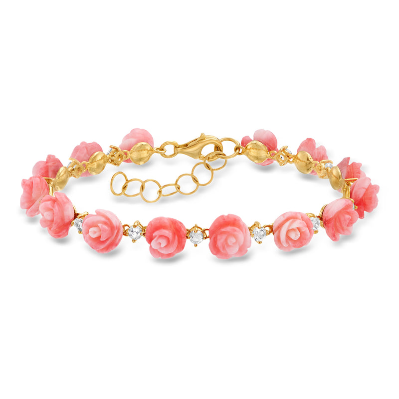 Gold bracelet with pink rose coral beads and tiny white stone accents