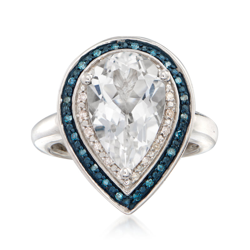 Sterling silver pear-shaped ring with clear stone center and blue topaz halo