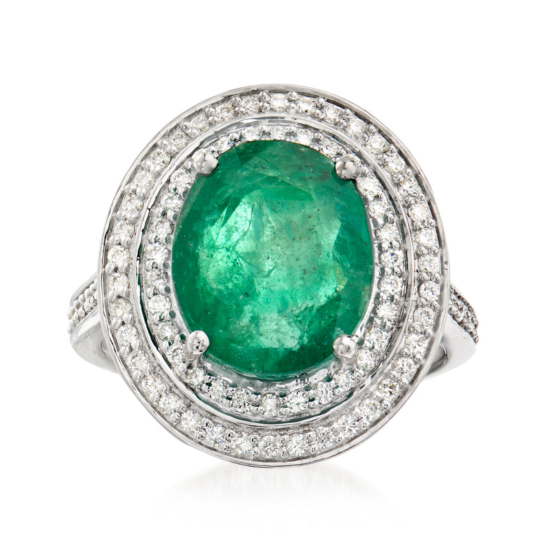 14k white gold ring with oval green emerald center and diamond halo, split shank