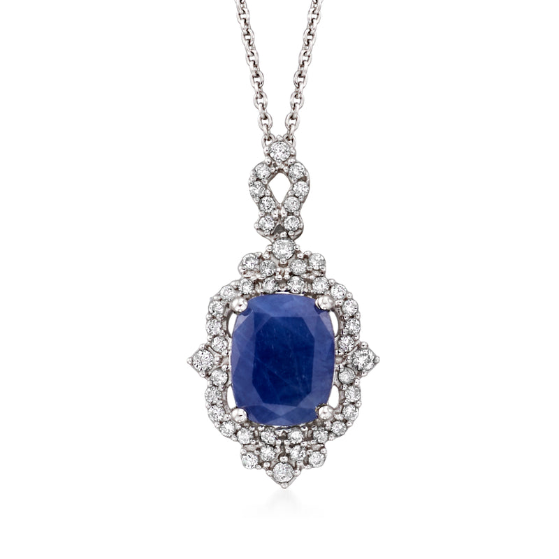 14kt white gold pendant necklace with blue sapphire haloed by diamonds