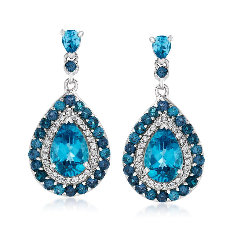 Sterling silver halo drop earrings with blue gemstones