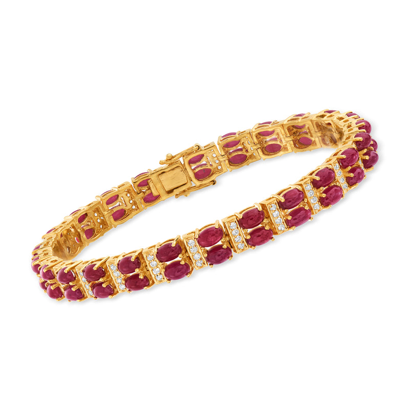 Two-row tennis bracelet with ruby red gemstones and gold-tone metal links