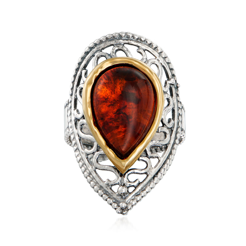Sterling silver openwork ring with teardrop amber gemstone and 14kt yellow gold bezel