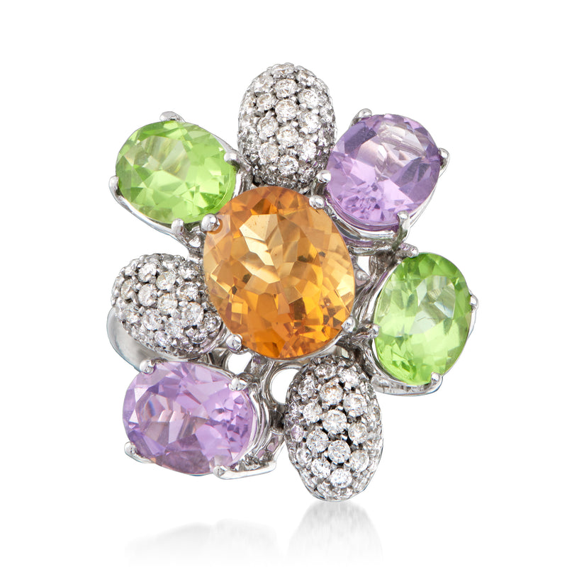18k white gold flower ring with orange center, green/purple gems, diamond accents